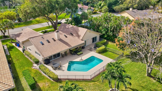 ranch-style house with a front lawn and a garage