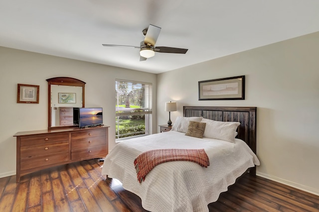 bedroom featuring ceiling fan and dark hardwood / wood-style floors