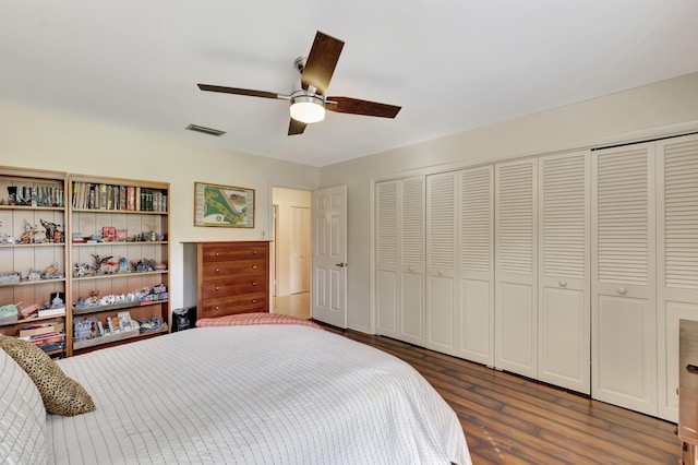 bedroom with ceiling fan and dark hardwood / wood-style flooring