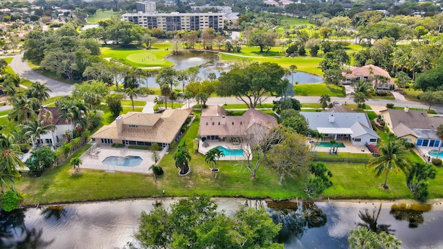 drone / aerial view with a water view