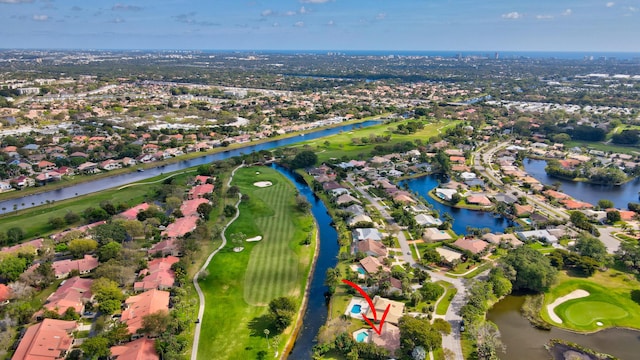 drone / aerial view featuring a water view