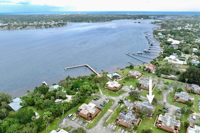 birds eye view of property featuring a water view