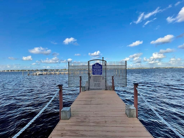 view of dock with a water view