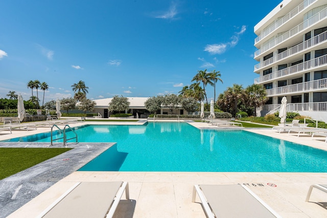 pool with a patio area