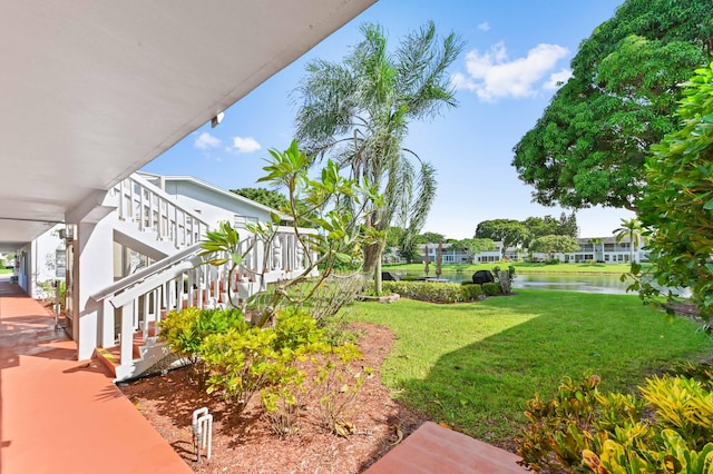 view of yard with a water view