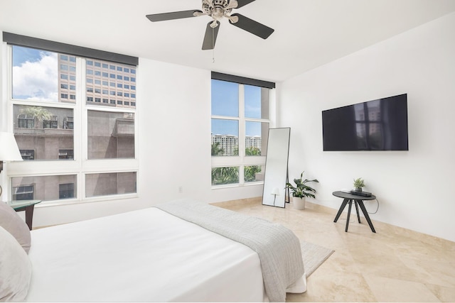 550 Okeechobee Blvd Unit 509, West Palm Beach, FL 33401 - tiled bedroom with a ceiling fan