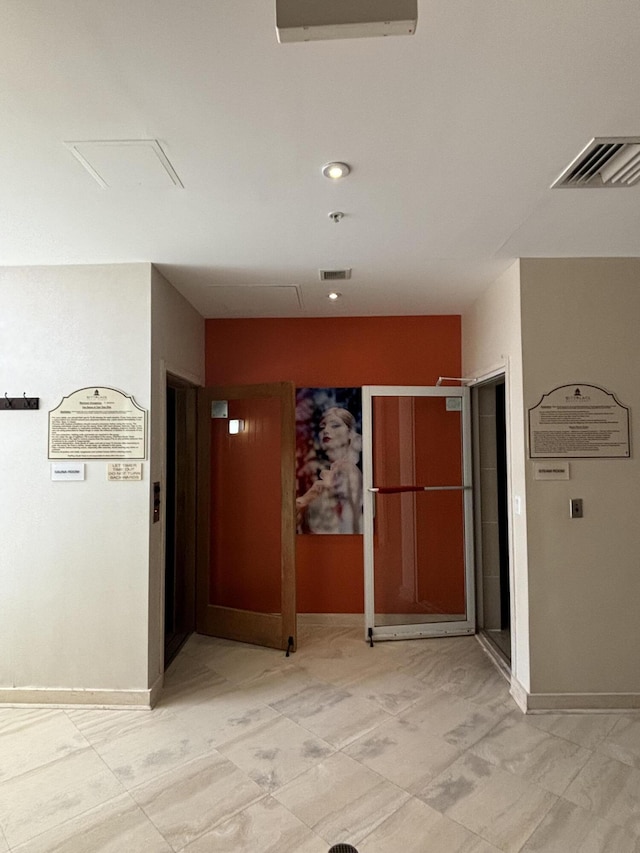 550 Okeechobee Blvd Unit 509, West Palm Beach, FL 33401 - corridor with baseboards