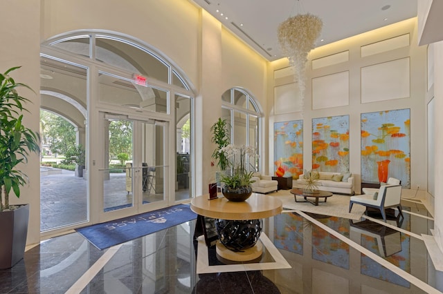 550 Okeechobee Blvd Unit 509, West Palm Beach, FL 33401 - building lobby featuring a high ceiling and recessed lighting