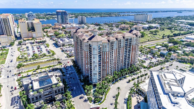 aerial view with a water view and a city view