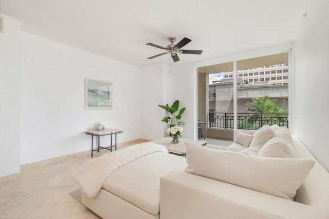 550 Okeechobee Blvd Unit 509, West Palm Beach, FL 33401 - living room featuring ceiling fan and floor to ceiling windows
