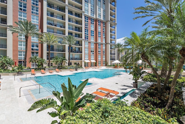 community pool featuring a patio area