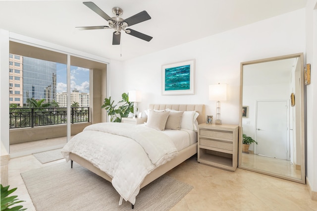 bedroom featuring ceiling fan and access to outside