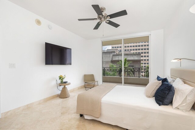 550 Okeechobee Blvd Unit 509, West Palm Beach, FL 33401 - tiled bedroom with a ceiling fan and floor to ceiling windows