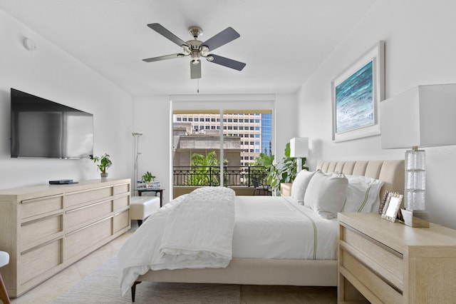 tiled bedroom with ceiling fan and access to outside