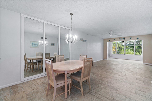 dining area featuring a textured ceiling, ceiling fan with notable chandelier, and light wood-type flooring