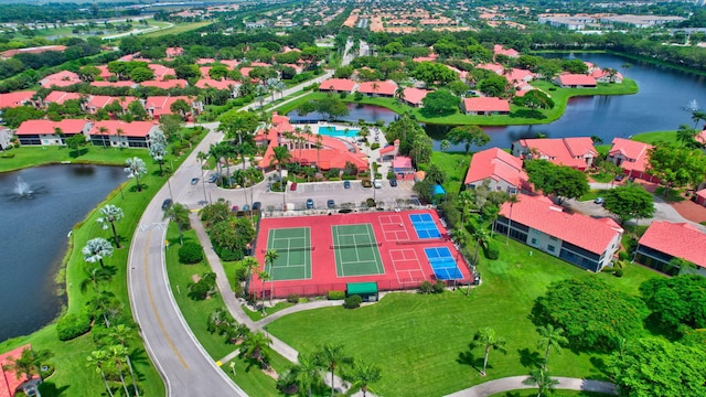 bird's eye view with a water view