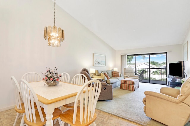 tiled dining room featuring high vaulted ceiling and an inviting chandelier