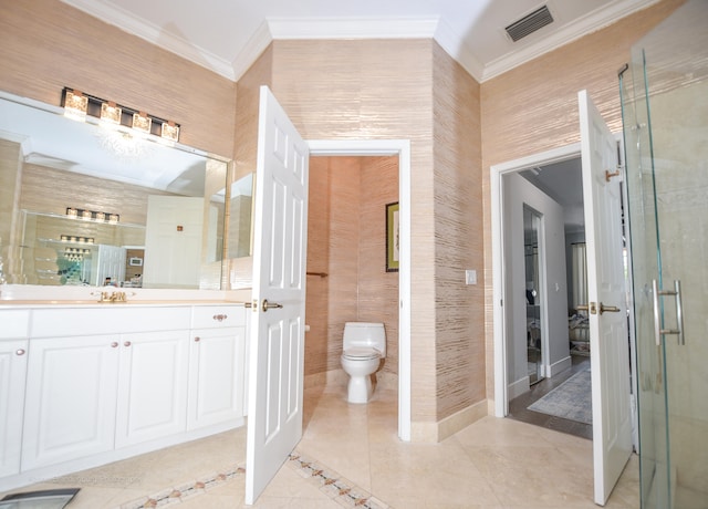 bathroom featuring vanity, crown molding, and toilet