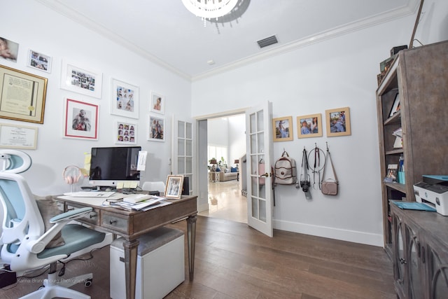 office space featuring french doors, dark hardwood / wood-style floors, and crown molding