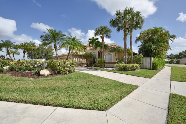 view of front of property with a front lawn