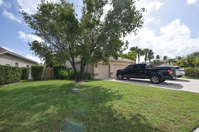 view of yard with a garage