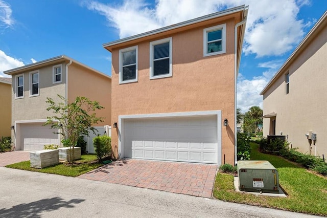 view of front of home with a garage