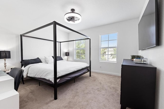 bedroom with light carpet