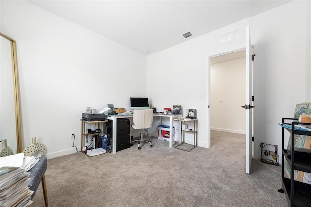 home office with light colored carpet