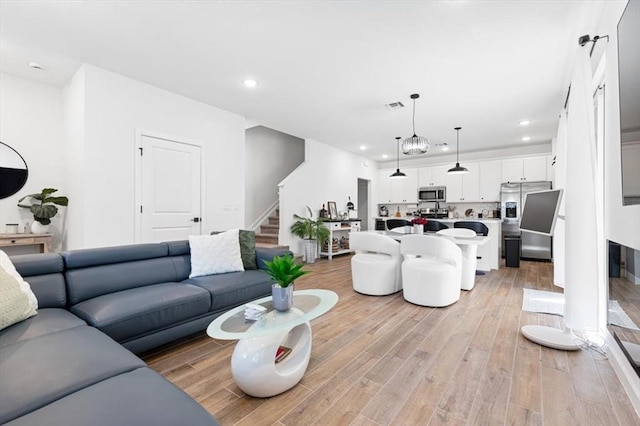 living room featuring light hardwood / wood-style flooring