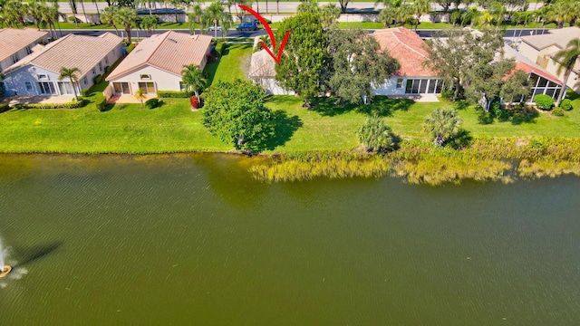 drone / aerial view with a water view