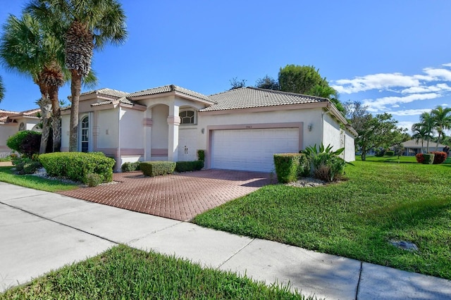 mediterranean / spanish-style home featuring a garage