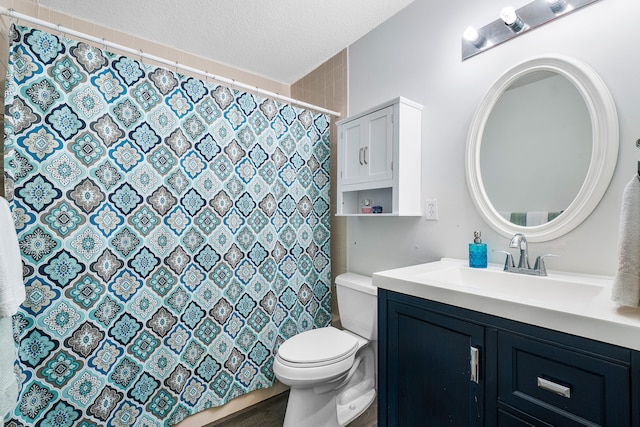 bathroom with wood-type flooring, curtained shower, a textured ceiling, toilet, and vanity