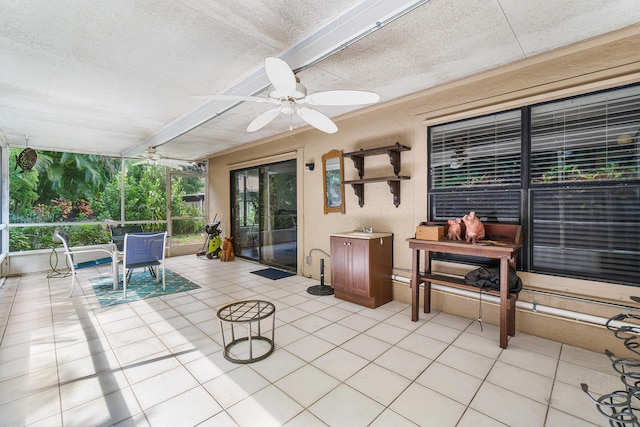 sunroom / solarium with ceiling fan