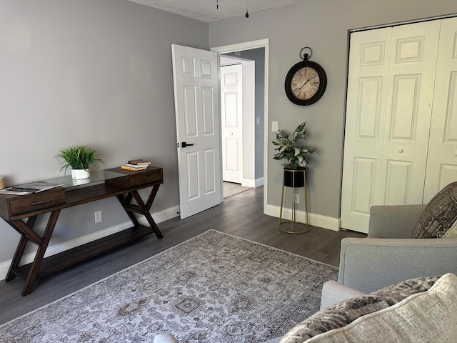 office area with dark wood-type flooring