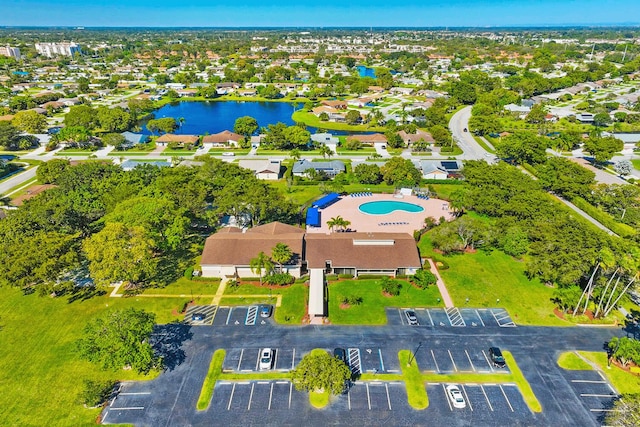 aerial view featuring a water view and a residential view