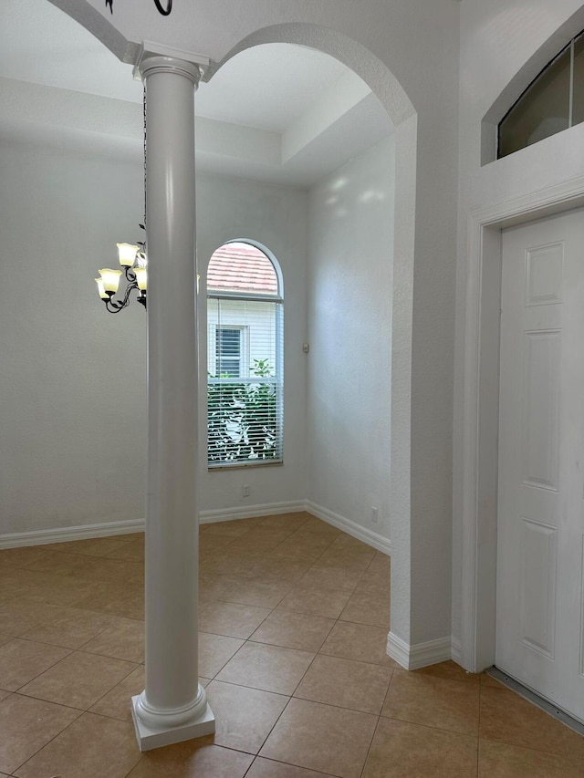 empty room with light tile patterned flooring