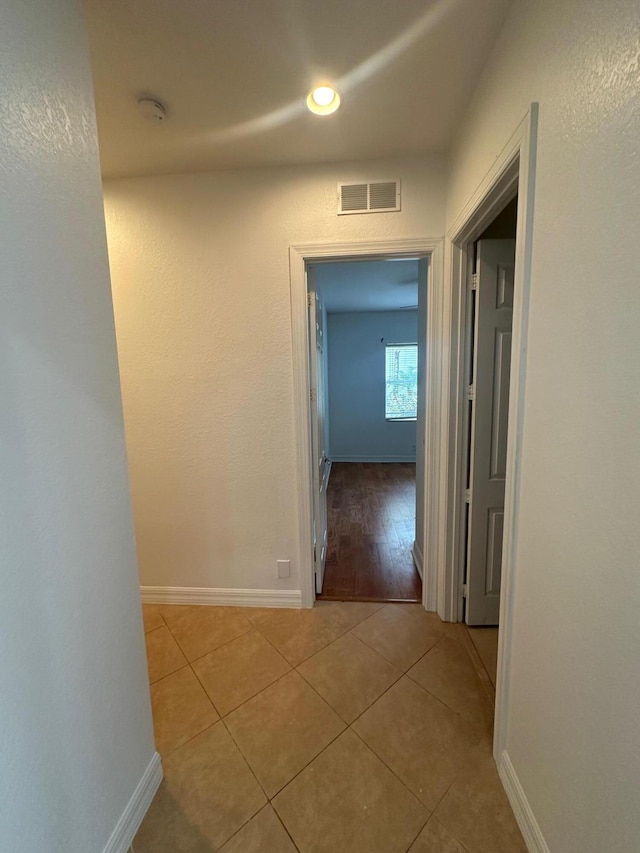 hallway featuring light hardwood / wood-style floors