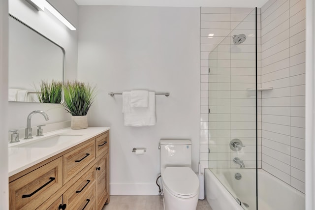 full bathroom featuring tile patterned flooring, vanity, toilet, and tiled shower / bath combo