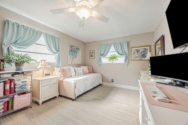 bedroom featuring ceiling fan and light wood-type flooring