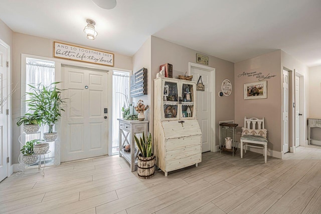 entrance foyer featuring light wood-type flooring