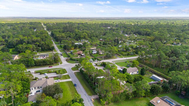 5481 Royal Palm Beach Blvd, West Palm Beach, FL 33411 - aerial view of property's location with a forest