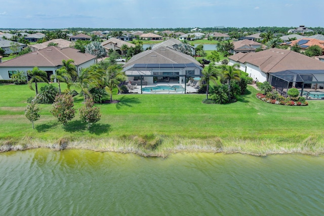 drone / aerial view with a water view