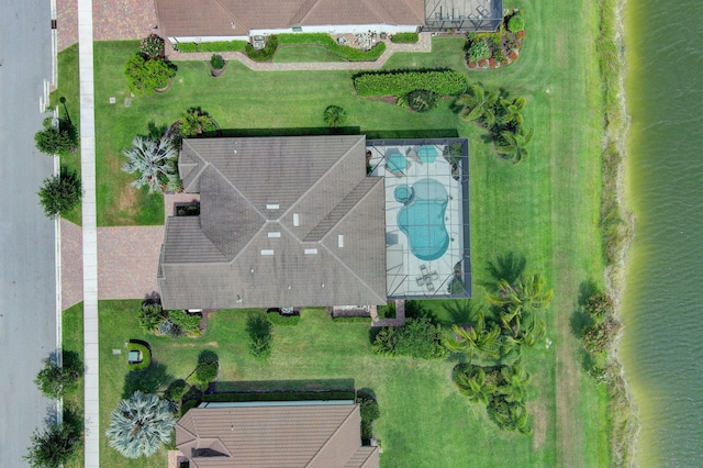 birds eye view of property featuring a water view