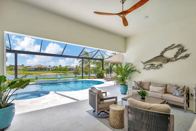 view of pool featuring ceiling fan, glass enclosure, a patio, outdoor lounge area, and a water view