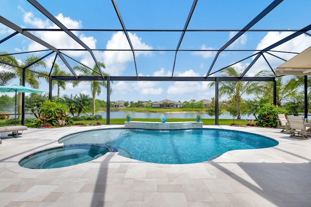 view of pool featuring an in ground hot tub, a water view, pool water feature, a lanai, and a patio