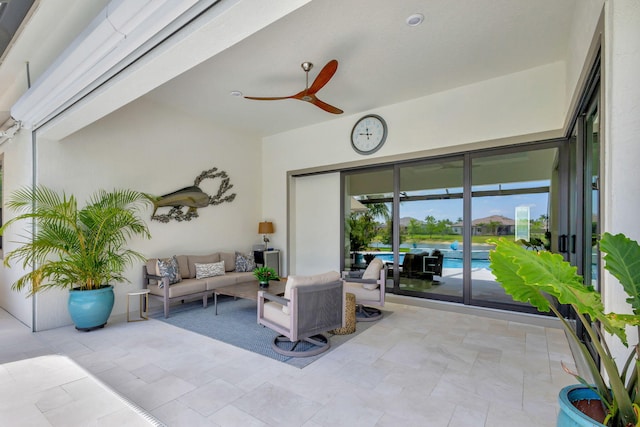 exterior space featuring an outdoor living space and ceiling fan