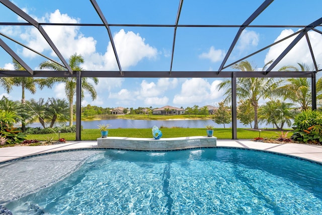 view of pool with pool water feature, a water view, and glass enclosure