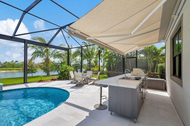 view of swimming pool with a patio, area for grilling, a lanai, and a water view