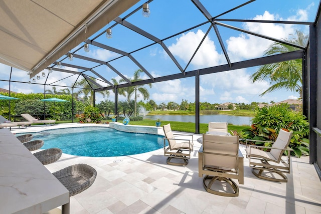 view of swimming pool featuring a patio area, pool water feature, a water view, and glass enclosure