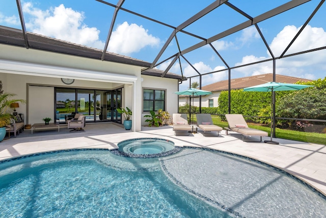 view of pool with a patio, an in ground hot tub, and glass enclosure